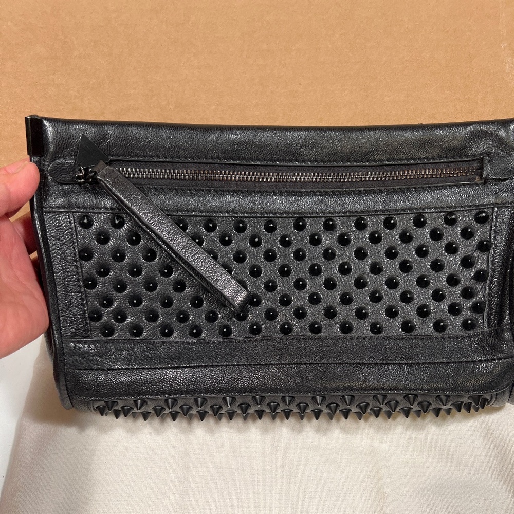 Gorgeous designer Golden Lane Black leather studded clutch $600